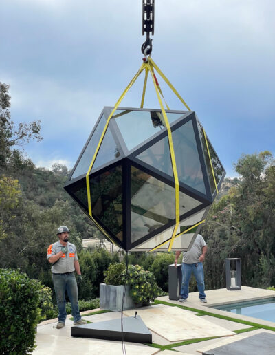 Crane lifting Glass Enclosure